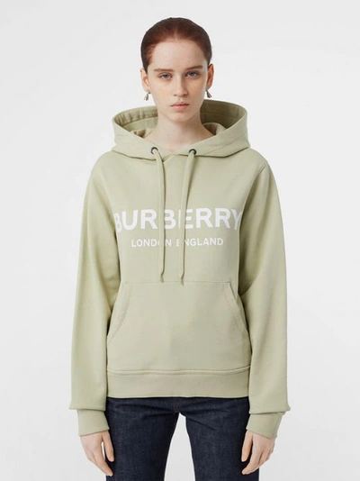 Shop Burberry Logo Print Cotton Oversized Hoodie In Pale Apple Green