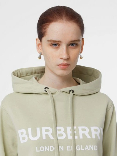 Shop Burberry Logo Print Cotton Oversized Hoodie In Pale Apple Green