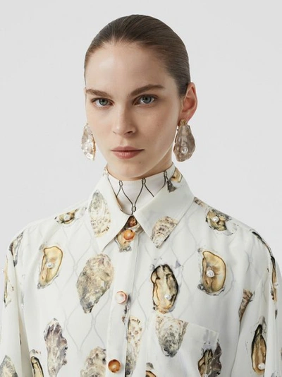 Shop Burberry Embellished Oyster Print Silk Oversized Shirt In White
