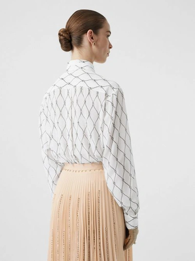 Shop Burberry Crystal Detail Net Print Silk Oversized Tie-neck Shirt In White