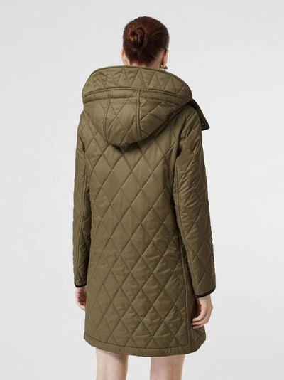 Shop Burberry Detachable Hood Monogram Motif Quilted Coat In Olive Green