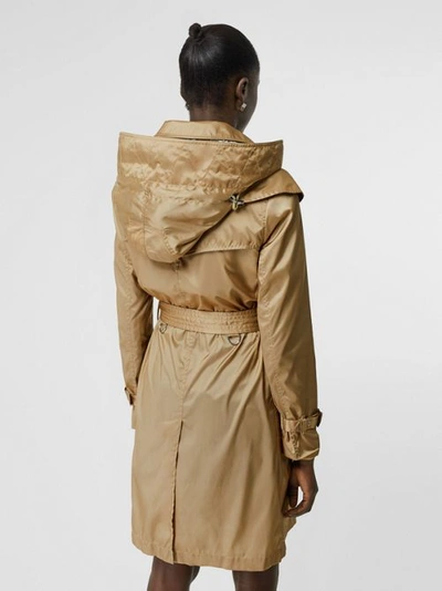 Shop Burberry Detachable Hood Econyl® Trench Coat In Honey