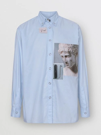 Shop Burberry Press-stud Collar Montage Print Oversized Shirt In Pale Blue