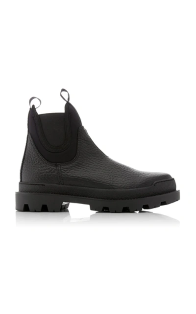 Shop Prada Lifestyle Leather Boots In Black