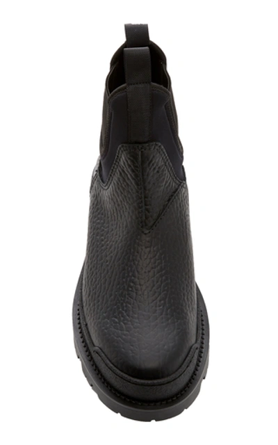 Shop Prada Lifestyle Leather Boots In Black