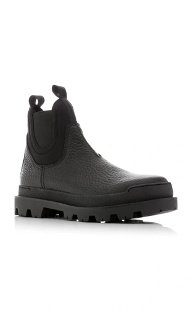 Shop Prada Lifestyle Leather Boots In Black