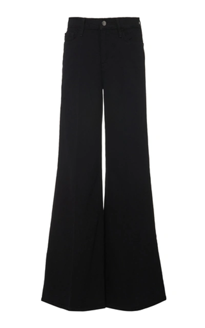 Shop Frame Le Palazzo High-rise Flared Jeans In Black