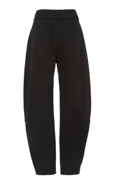 Shop Ulla Johnson Storm High-rise Tapered Jeans In Black