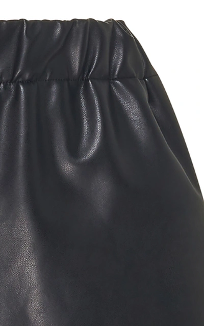 Shop Tibi Faux Leather Mini Shorts In Black