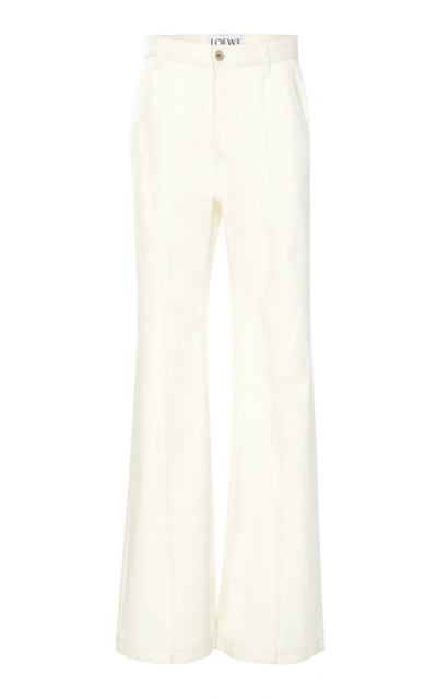 Shop Loewe High-rise Flared Jeans In White