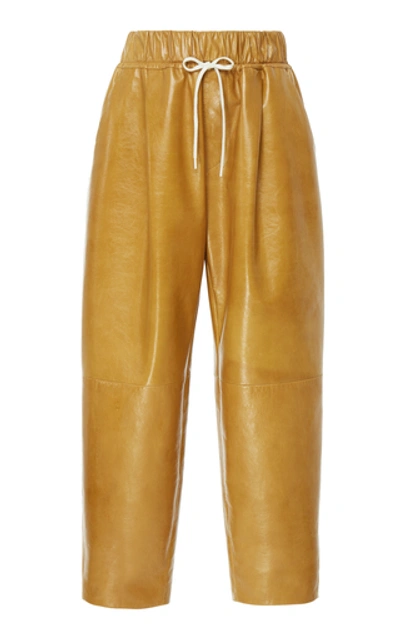 Shop Givenchy Leather Tapered Pants In Neutral