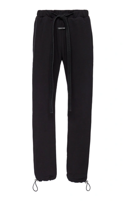 Shop Fear Of God Core Tapered Cotton Sweatpants In Black