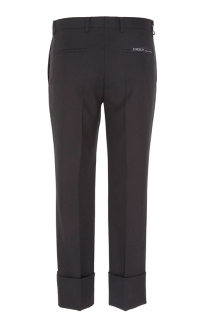 Shop Givenchy Wide-cuff Slim Wool Trousers In Black