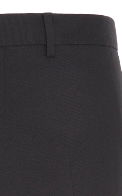 Shop Givenchy Wide-cuff Slim Wool Trousers In Black