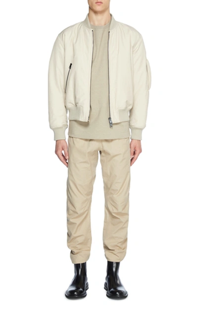 Shop Bottega Veneta Nylon Bomber Jacket In Neutral