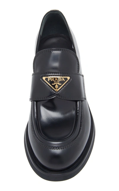 Shop Prada Leather Platform Loafers In Black