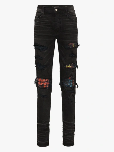 Shop Amiri Mx1 Vintage Patch Slim Leg Jeans In Black
