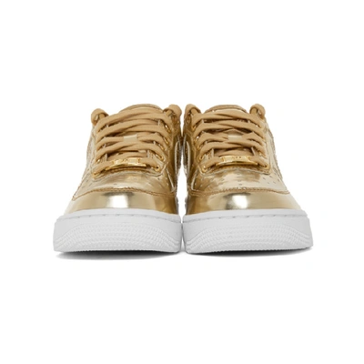 Shop Nike Gold Air Force 1 Sp Sneakers