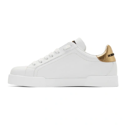 Shop Dolce & Gabbana Dolce And Gabbana White And Gold Crest Portofino Sneakers In 8i047bianco