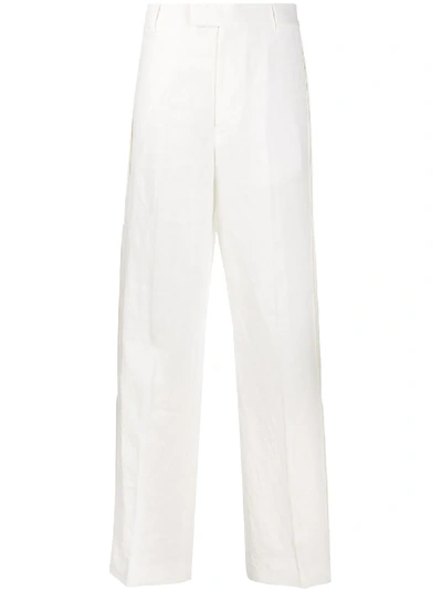 Shop Jw Anderson Creased Wide Trousers In White