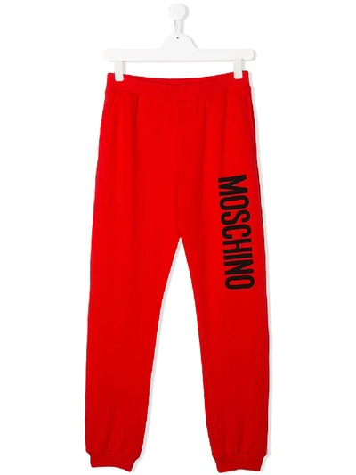 Shop Moschino Logo Jersey Trousers In Red