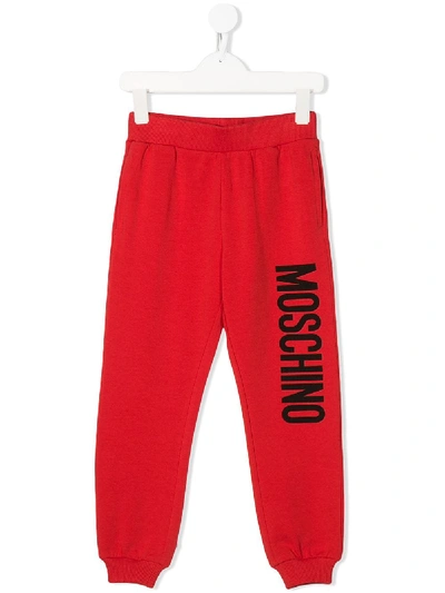 Shop Moschino Logo Print Joggers In Red