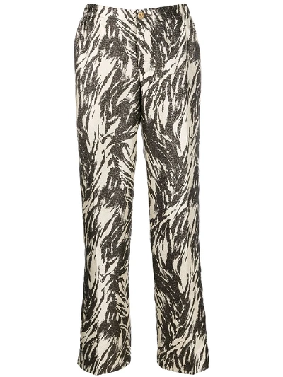 PRINTED TAPERED TROUSERS