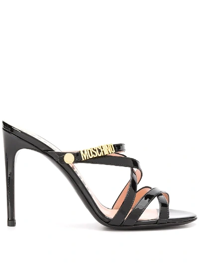 Shop Moschino Strappy Mules In Black