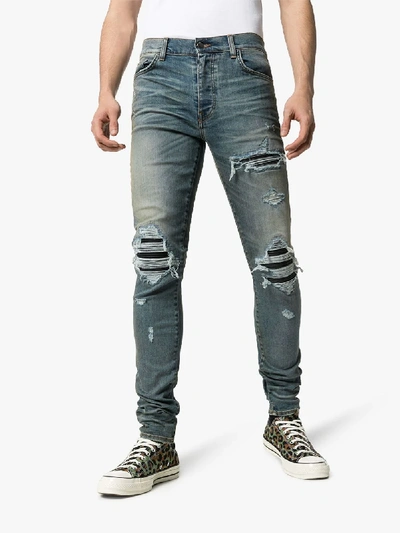 Shop Amiri Mx1 Leather Patch Slim Leg Jeans In Blue