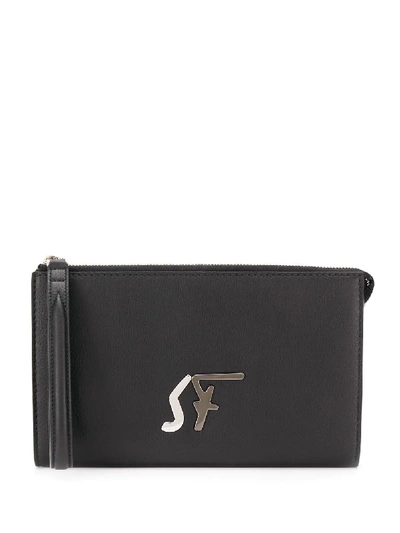 Shop Ferragamo Logo Clutch Bag In Black