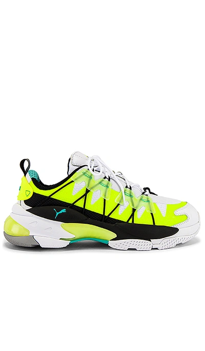 Shop Puma Lqd Cell Omega Lab In White & Yellow Alert