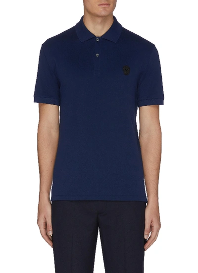 Shop Alexander Mcqueen Skull Embroidered Polo Shirt In Blue