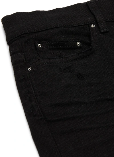 Shop Amiri Stacked Jeans In Black