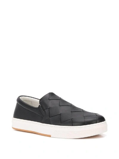 Shop Bottega Veneta Maxi Weave Slip-on Sneakers In Black