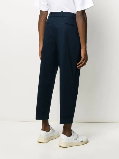 Shop Acne Studios Cropped Tapered Trousers In Blue