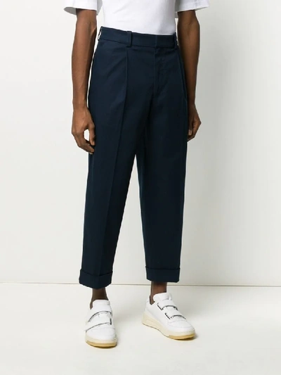 Shop Acne Studios Cropped Tapered Trousers In Blue