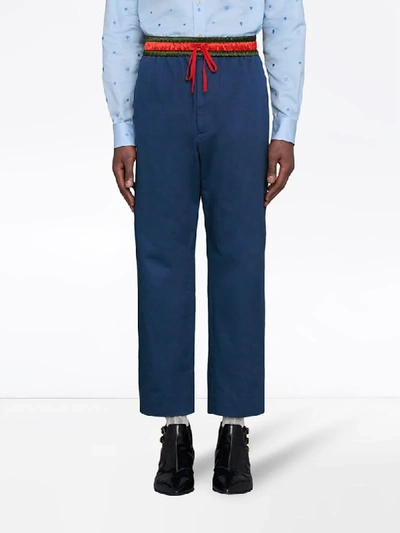 Shop Gucci Logo Detail Cropped Trousers In Blue