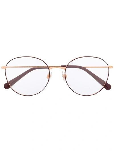 Shop Dolce & Gabbana Round Glasses In Red