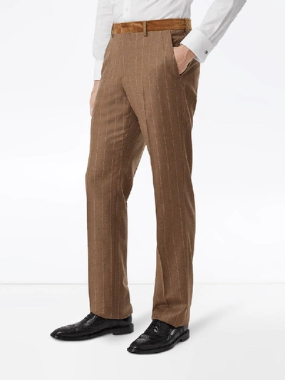 Shop Burberry Striped Straight-leg Trousers In Brown