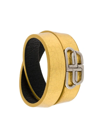 Shop Balenciaga Logo Plaque Wrap Style Bracelet In Gold