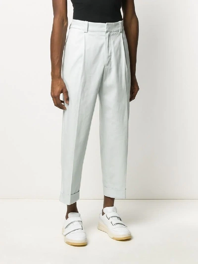 Shop Acne Studios Cropped Tapered Trousers In Blue