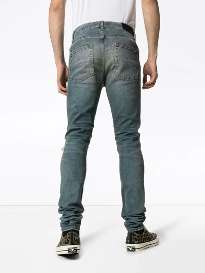 Shop Amiri Mx1 Distressed-effect Slim-leg Jeans In Blue