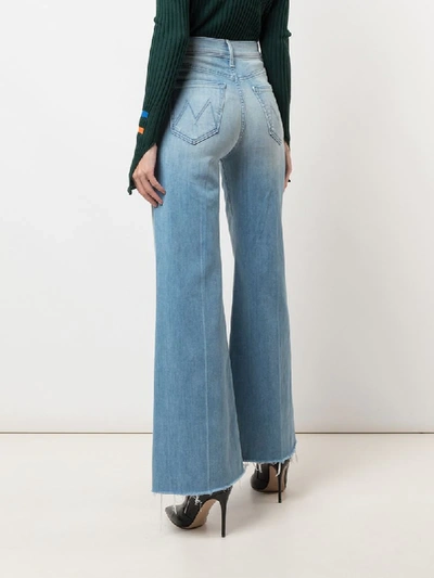 Shop Mother High Rise Flared Jeans In Blue