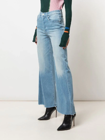 Shop Mother High Rise Flared Jeans In Blue