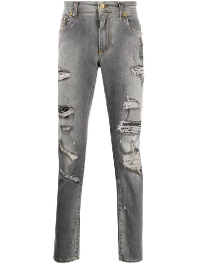 Shop Dolce & Gabbana Heraldic Patch Ripped Jeans In Grey