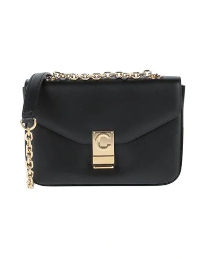 Shop Celine Handbags In Black