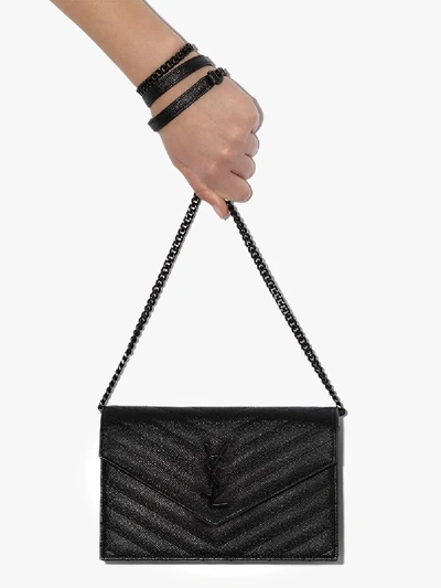 Shop Saint Laurent Black Monogram Leather Envelope Clutch Bag