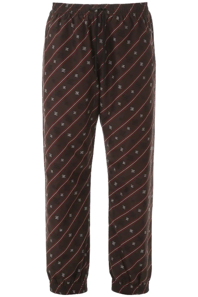 Shop Fendi Karligraphy Pants In Brown,red,beige
