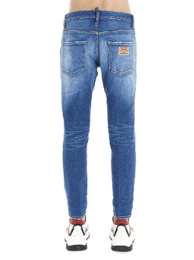 Shop Dsquared2 Patch Embellished Distressed Jeans In Blue