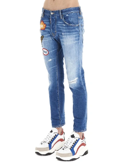 Shop Dsquared2 Patch Embellished Distressed Jeans In Blue